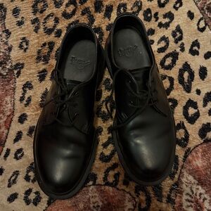 Black Leather Dr, Martens Shoes The shoes are size 9 in women and 7 in men’s